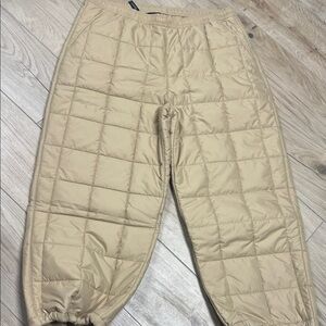 The North Face Women's Lhotse Pants in the "Khaki Stone" colorway.